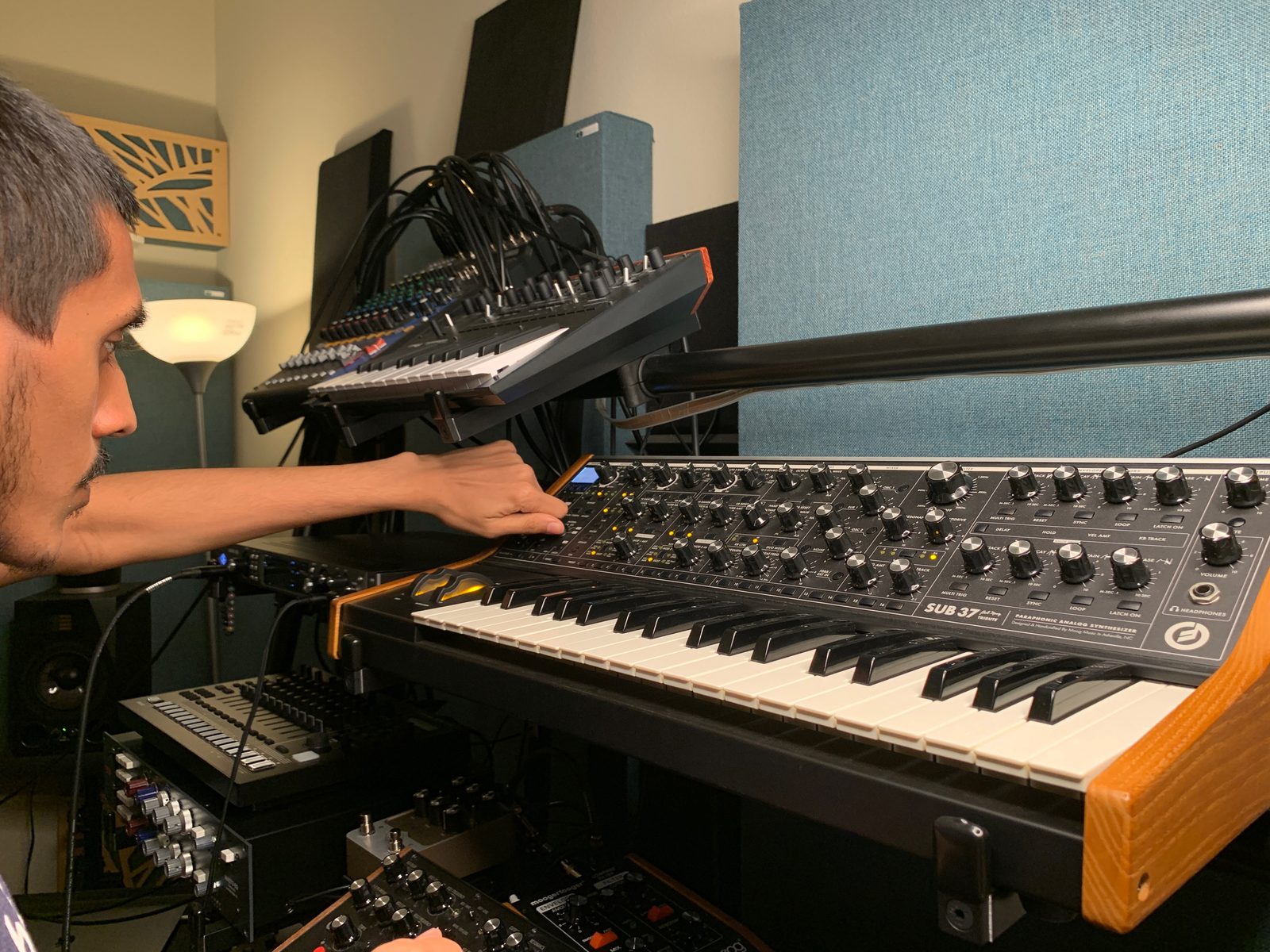 Dilawar Zaman playing the Moog Subsequent 37 in the studio